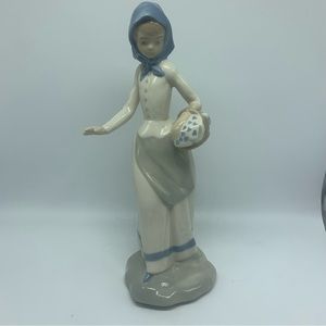 Vintage Peasant Girl Wearing Blue Scarf and carrying Basket of Hearts